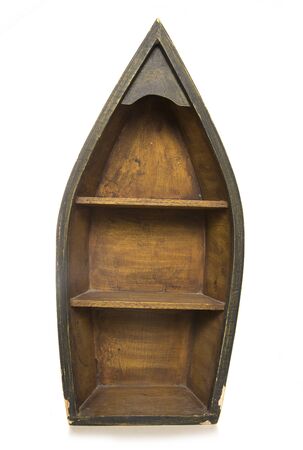 boat shape book shelf isolated on a white backgroundの写真素材