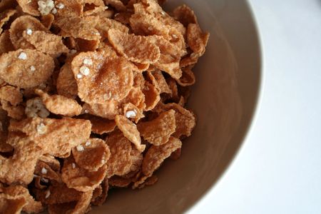 A bowl of nutritious breakfast flakes.