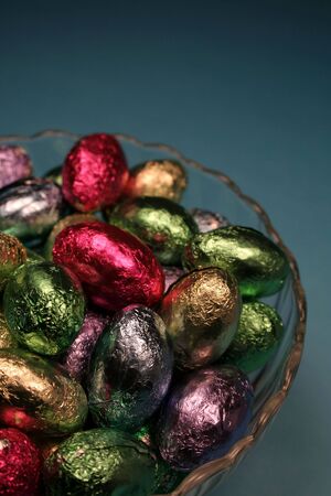 A bowl of foil chocolate Easter eggs.