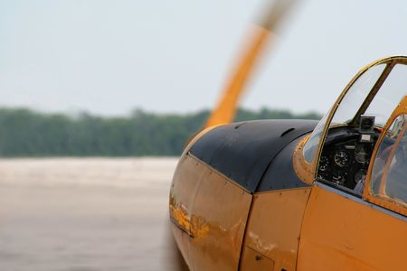 A old propeller plane ready for takeoff.