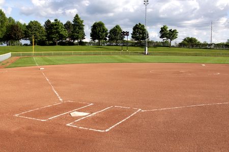 A view of a softball diamond at dusk.の写真素材
