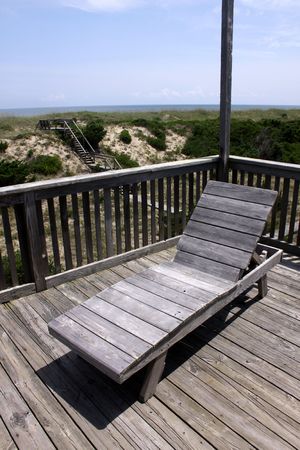 A deck chair sitting on the balcony in the Outer Banks, North Carolina.