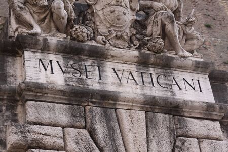 The lettering above the entrance to the Vatican Museums, in Rome, Italy.のeditorial素材