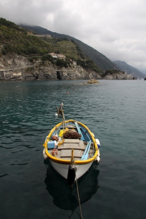 A fishing boat moored in the harbor of Monterosso al Mare.  の写真素材