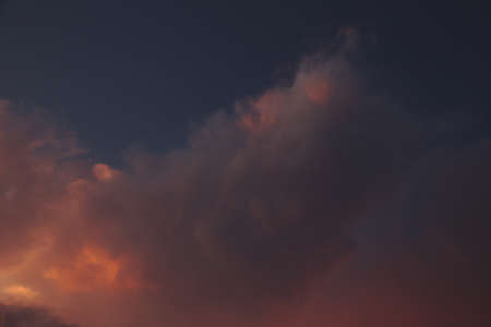 A hole pink cloud shot at dusk.の写真素材