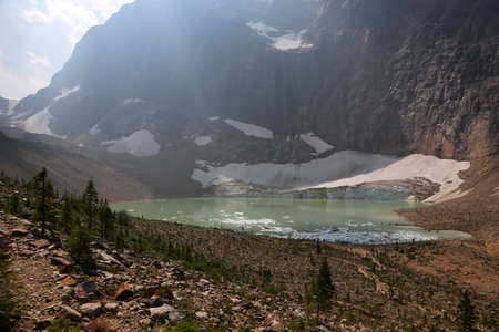 The glacial pool that has forms under the Angel Glacier as it melts, located in Jasper National Park, Alberta, Canada.の写真素材