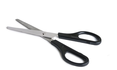 black scissors on a white background の写真素材