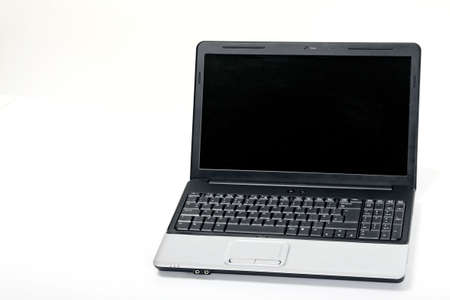 An open lap-top computer isolated on a white background