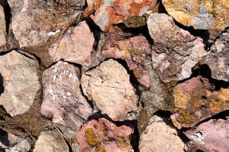 Close up view of a roughly made stone wall