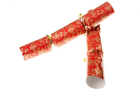 Two red christmas crackers isolated against a white backgroundの写真素材