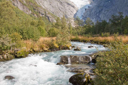 Melt-waters from the Briksdal galcier near Olden in Norwayの写真素材