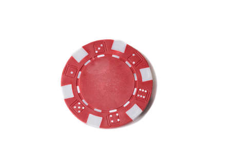 Close up of a single red gaming chip isolated against a white backgroundの写真素材