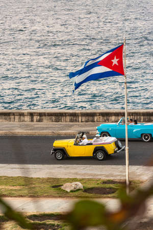 One of Havana's great attractions is taking a tour of the city in traditional old and colorful cars.のeditorial素材