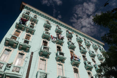 Deco and colonial architecture live side by side on the old facades of the Cuban capital.のeditorial素材