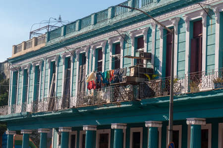 Deco and colonial architecture live side by side on the old facades of the Cuban capital.のeditorial素材
