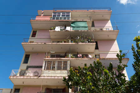 Deco and colonial architecture live side by side on the old facades of the Cuban capital.のeditorial素材