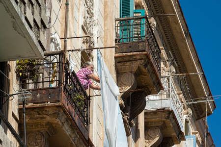 Deco and colonial architecture live side by side on the old facades of the Cuban capital.のeditorial素材