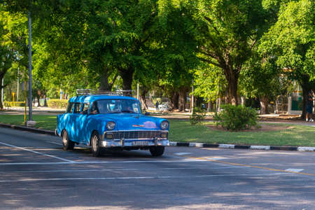 Blue and white car on the track.のeditorial素材