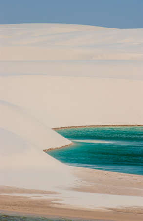 White sand dunes and seasonal lagoons in the LenÃ§ois Maranhenses National Park, MaranhÃ£o, Brazilのeditorial素材