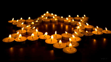 Burning Candles as a Starの写真素材