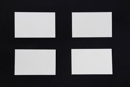 blank white paper on wood background. business card with rustic style.