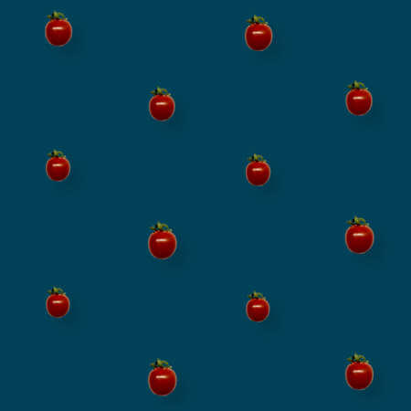 Colorful pattern of fresh red tomatoes on blue background. Top view. Flat lay. Pop art designの写真素材