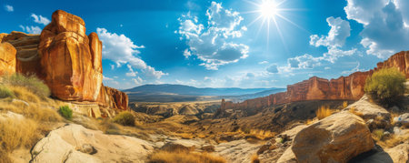 Scenic desert landscape with rock formations and blue sky, panoramic view. Nature and adventure conceptの素材