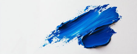 Blue paint brush strokes on white background, abstract art conceptの素材