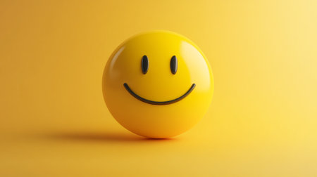 Smiley face on yellow background, cheerful conceptの素材