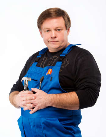 Professional worker in uniform with hammerの写真素材