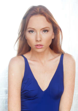 Young model in blue swimsuitの写真素材