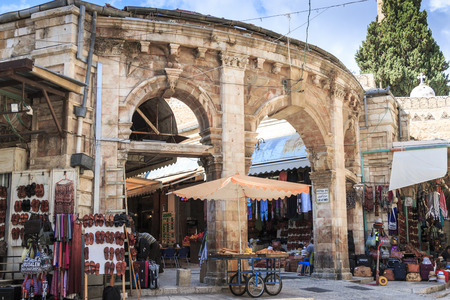 Historic entrance to Muristan area of the Jewish Quarter, market stalls and vendors light the street just as in biblical times.のeditorial素材