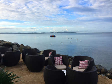 Beach Chairs by the Waterの写真素材