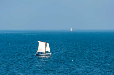 Sailboats sailing on the deep blue seaのeditorial素材