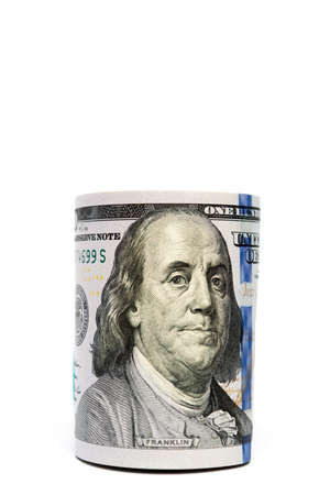 Benjamin Franklin detail on hundred-dollar bill stash isolated with copyspace