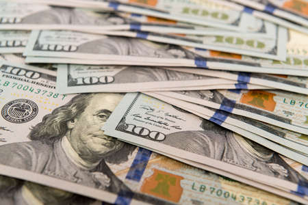 Heap of cash in hundred dollar bankontes
