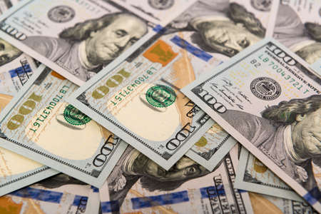 Heap of cash in hundred dollar bankontes