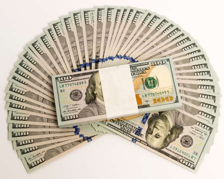 Stack of money in US dollars in cash in hundred dollar bills