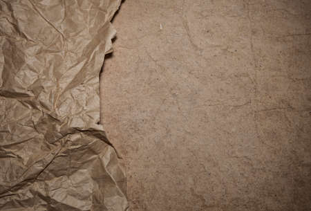 cardboard background and riped vintage paper