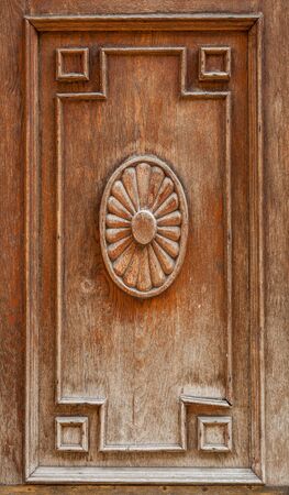 Old carved wooden door frameの写真素材