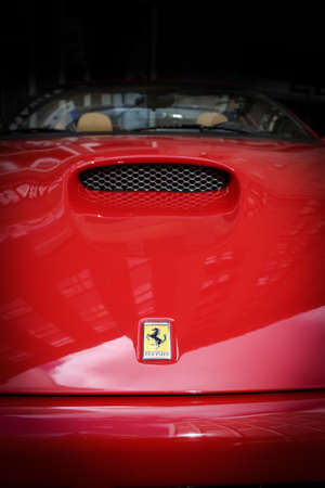Chicago, USA - September 9 : Ferrari Fest 2012 held in Chicago, Ill. on September 9, 2012. Image of a red Ferrari hood.のeditorial素材