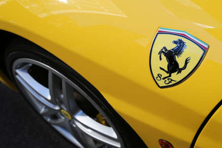 Chicago, USA - September 9 : Ferrari Fest 2012 held in Chicago, Ill. on September 9, 2012. Image of a yellow Ferrari fender.のeditorial素材