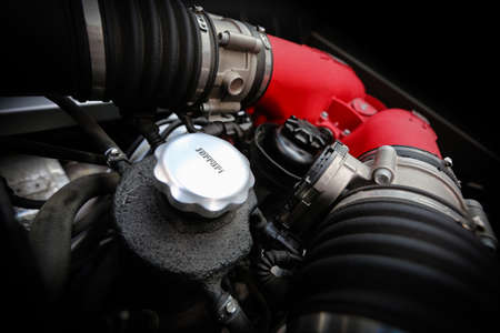 Chicago, USA - September 9 : Ferrari Fest 2012 held in Chicago, Ill. on September 9, 2012. Detailed macro image of a Ferrari engine.のeditorial素材