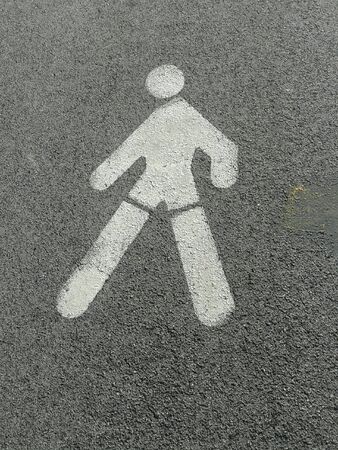 Walk symbol on roadの素材