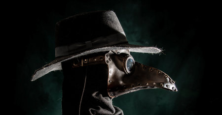 steempunk plague doctor costume for halloween with leatherの写真素材