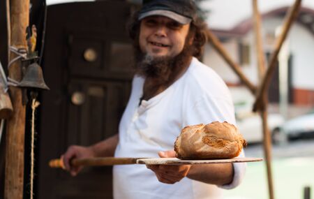 men baking breadの写真素材
