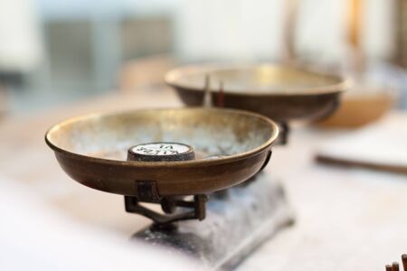 Kitchen scales with weights on the table