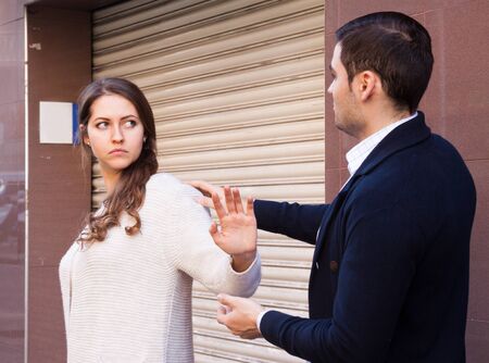 guy meets a girl on the streetの写真素材