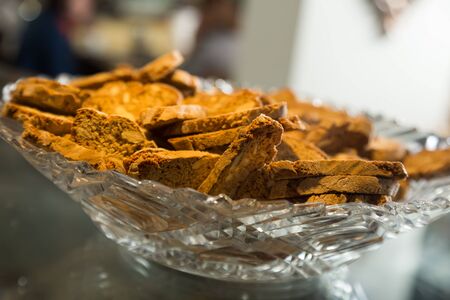 delicious cookies with almonds in a crystal vaseの写真素材