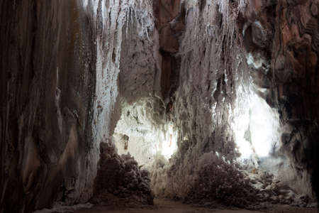 natural grotto at cave with white  natural stalactitesの写真素材